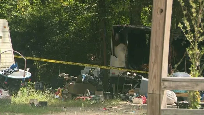 Charging documents: Parents accused of locking children in RV with faulty refrigerator before deadly Liberty County fire