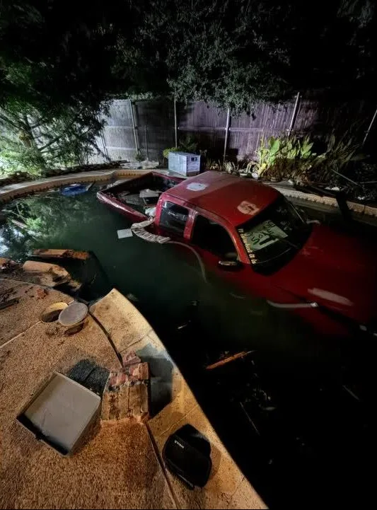 Pickup truck crashes into pool at home in The Colony; driver flees