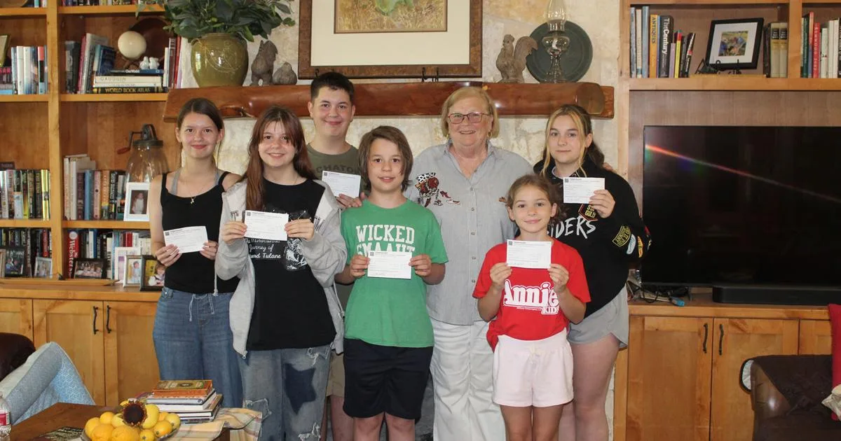 Barbara Bryan holds Nana Camp for six grandchildren