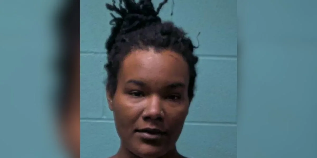 Woman arrested after driving recklessly with boyfriend on hood of car, deputies say