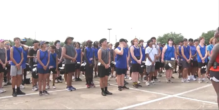 Pride of Pearland Band celebrates end of summer rehearsal with firetruck cooldown