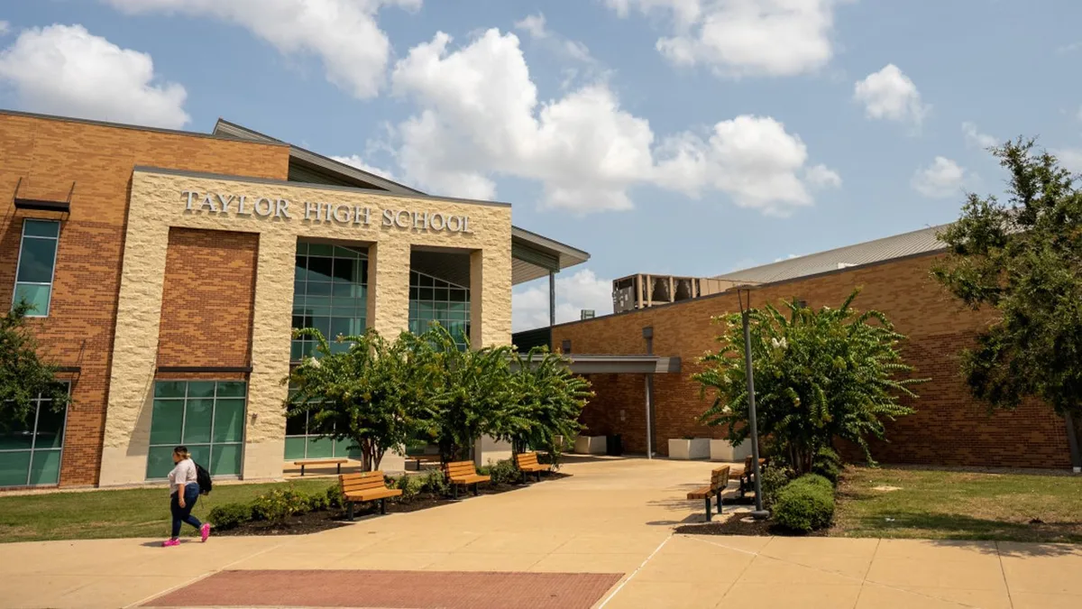 Taylor student found dead in vehicle on campus