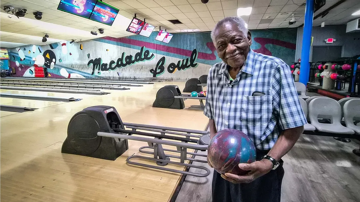 100-year-old veteran still bowls strikes