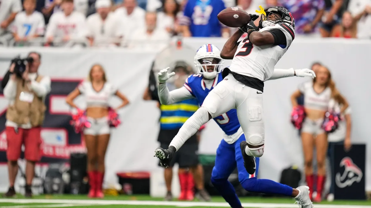 Josh Allen connects with Joshua Palmer for a late TD and Bills beat Texans 36-31 in wild opener