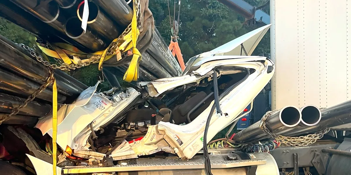 Lufkin firefighters extract trapped 18-wheeler driver from smashed cab following wreck