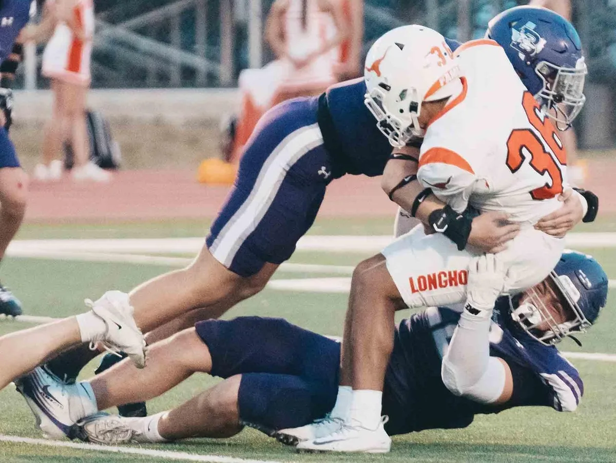 Hounds hold off Horns, 41-34