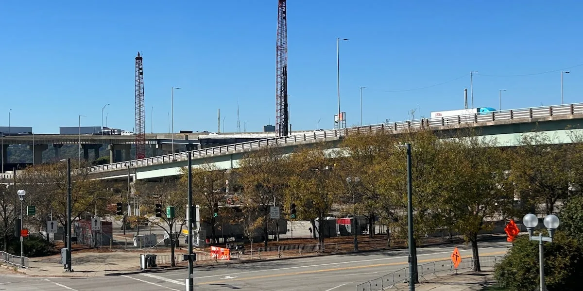 Worker dies after crane falls at bridge construction site