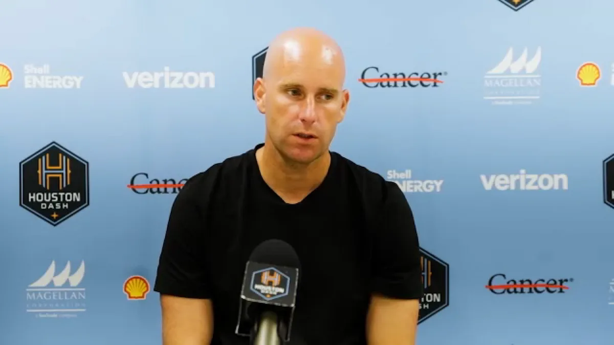 Houston Dash fire coach Fabrice Gautrat and technical director Twila Kilgore