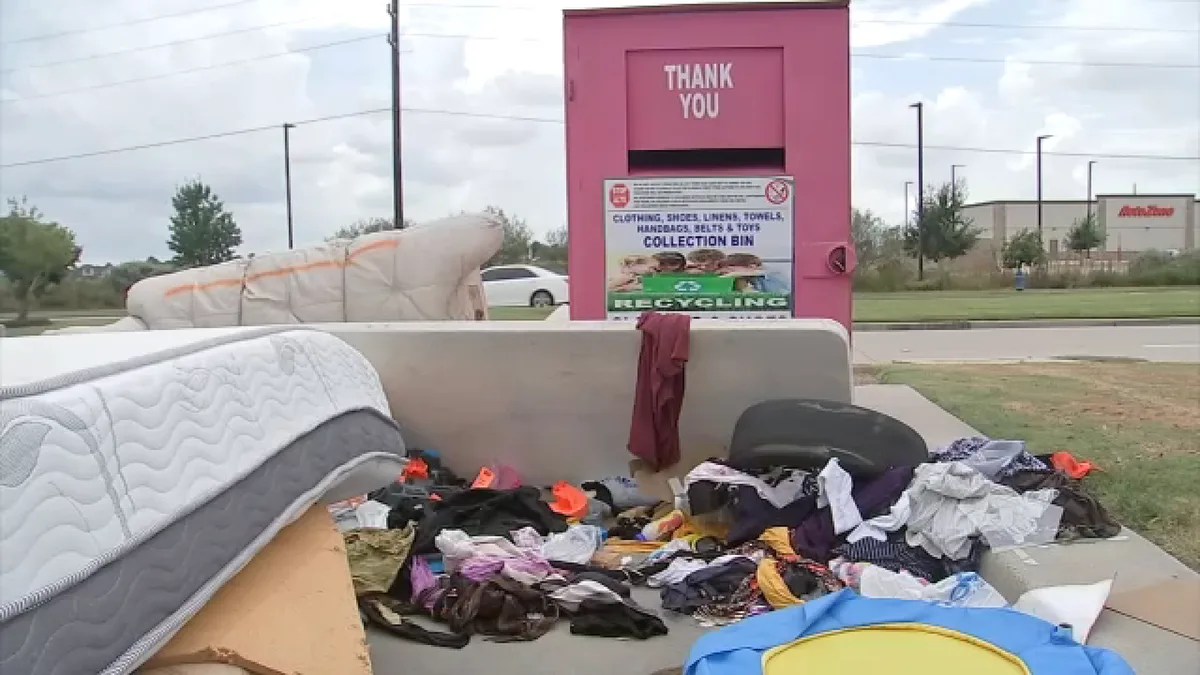 Neighbors concerned after clothing donation box in Cypress attracts illegal dumping