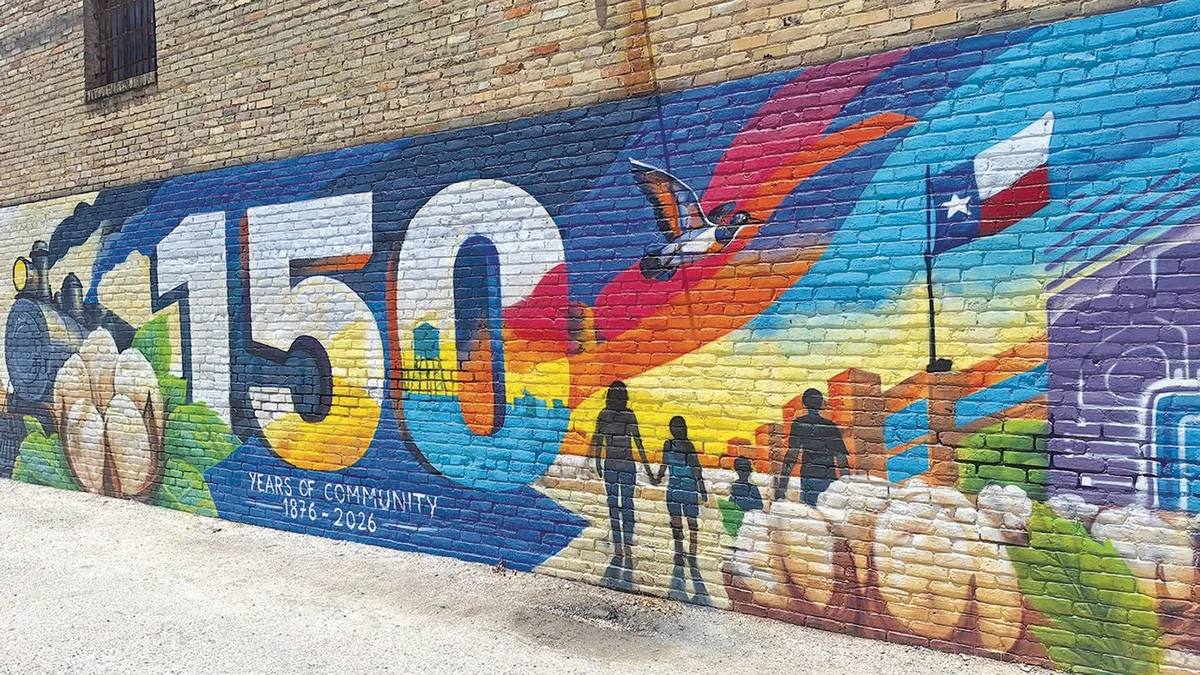 Local artist restores Taylor city mural after vandalism