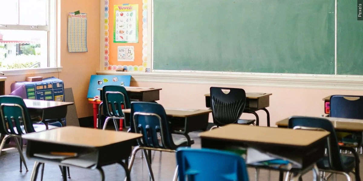 Assistant principal accused of shooting a gun during a school break-in charged, police say