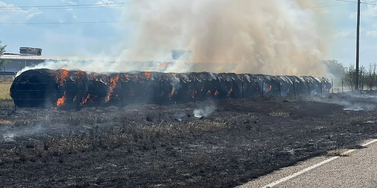Crews respond to grass fire, burning hay bales on side of I-20 in Lindale