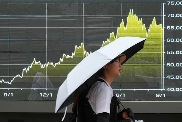 Asian shares are mixed as chipmaker shares rally in Tokyo and Seoul