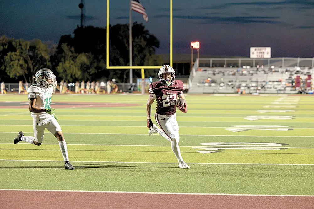 TIGERS WIN DISTRICT OPENER 67-3 OVER ROCKETS