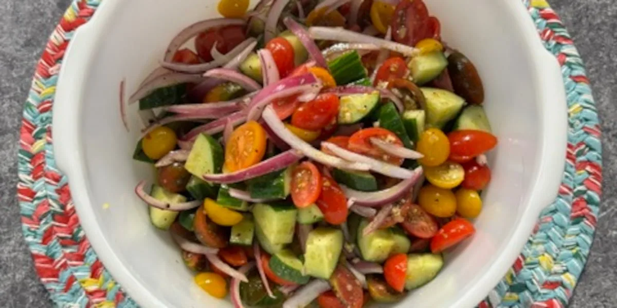 Rustic cucumber and tomato salad by Robbie Shoults of Bear Creek Smokehouse