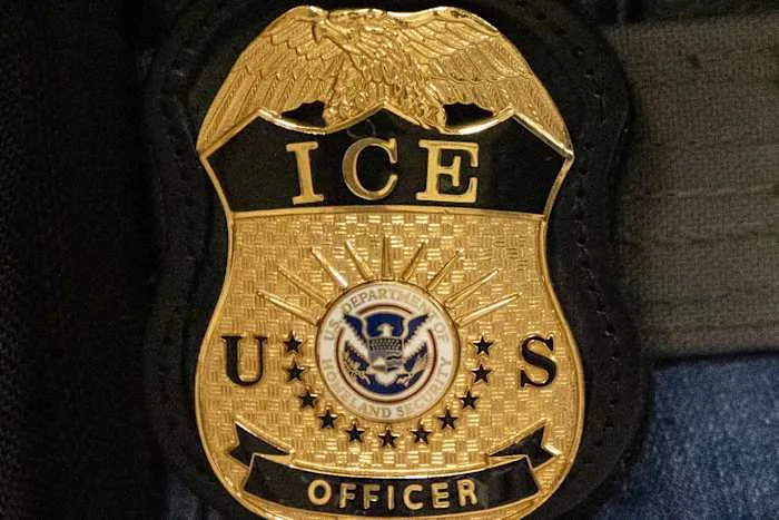 ICE officer lied about shovel and broom attack before Minnesota shooting, Justice Department alleges