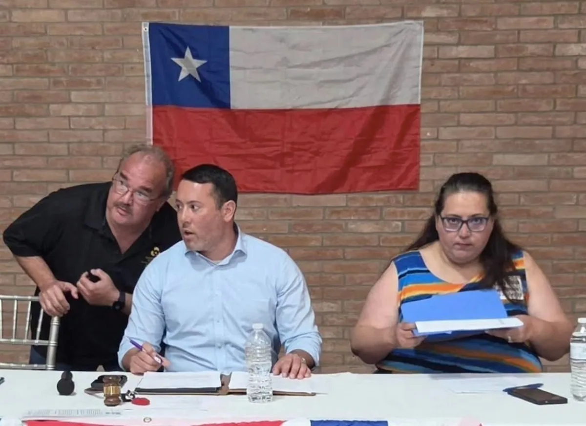 Hidalgo County Democrats face online ridicule for hanging Chilean flag during meeting