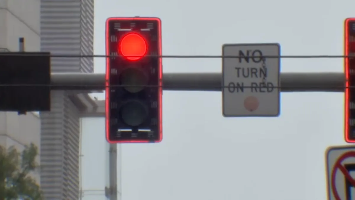 Woman says she was attacked in her car while stopped at a red light in downtown Houston