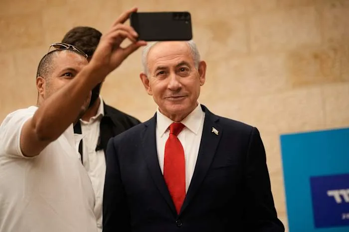 With his eye on reelection, Israel's Netanyahu turns his focus to his divided base