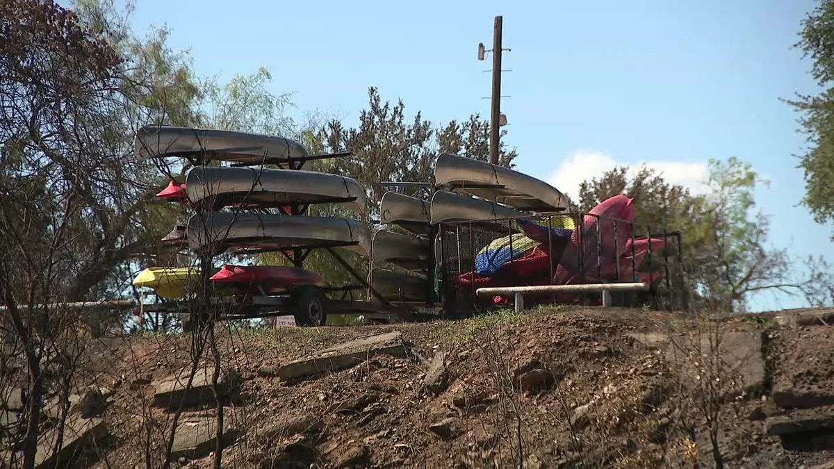 Ross Fire survivors reopen canoe rental business under family's historic tree