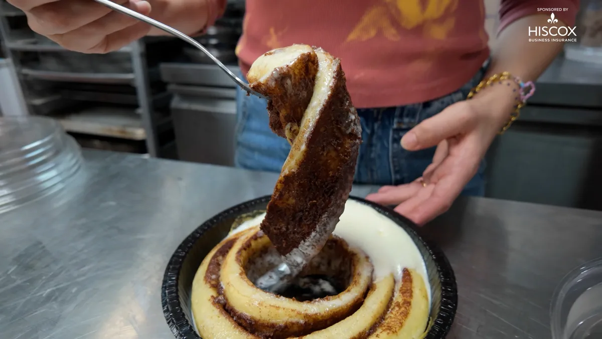 Giant cinnamon bun baker wants customers to share the joy