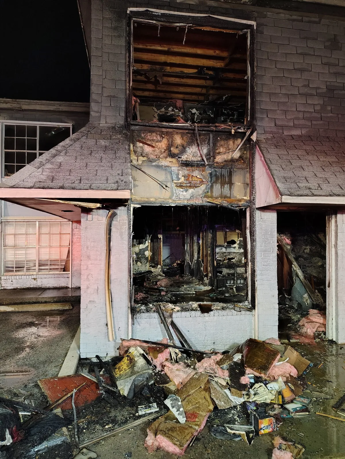 Man charged with arson after apartment fire displaces 24