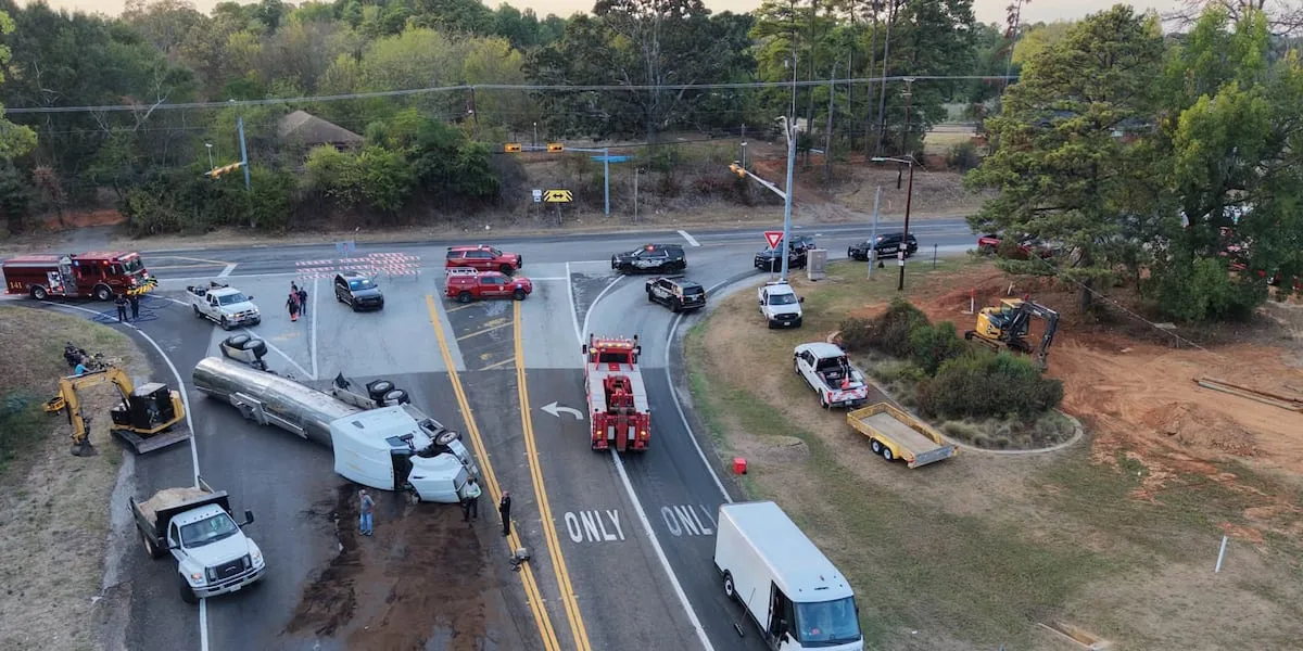 18-wheeler carrying 5,500 gallons of fuel overturns in Gladewater