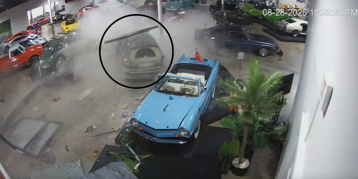 Watch as a vehicle slams into a classic car collection