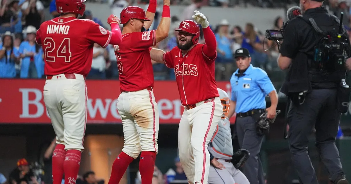 Langford and Burger homer in a four-run eighth as the Rangers beat the Astros 7-3