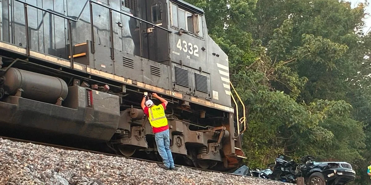 Train slams into passenger side of an SUV, crushing it, officials say