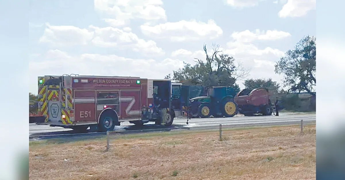 Hay baler catches fire