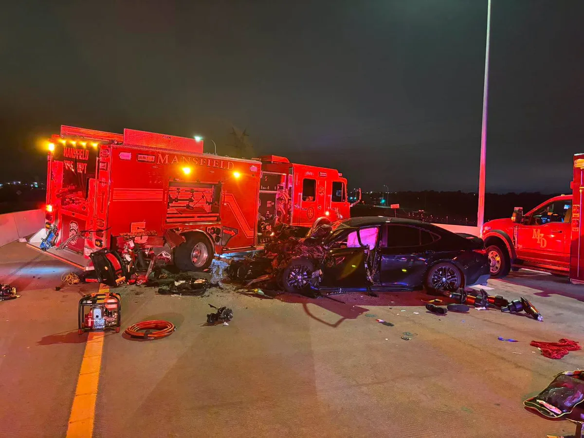 Mansfield fire engine hit by vehicle while blocking traffic on State Highway 360