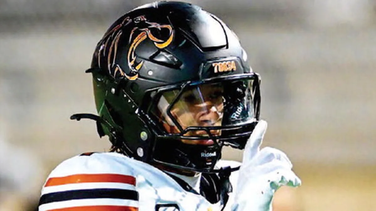 Hutto defeats Rouse on road
