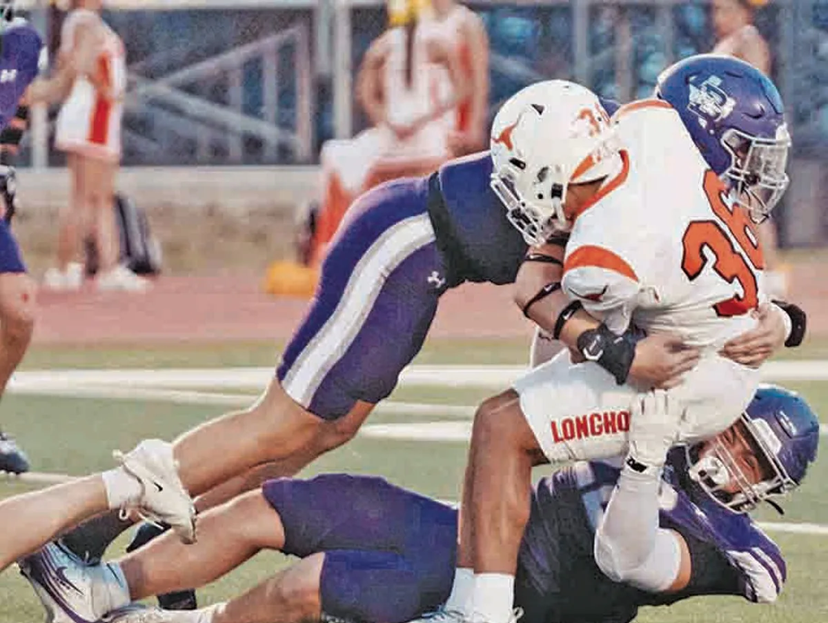 Hounds hold off Horns, 41-34