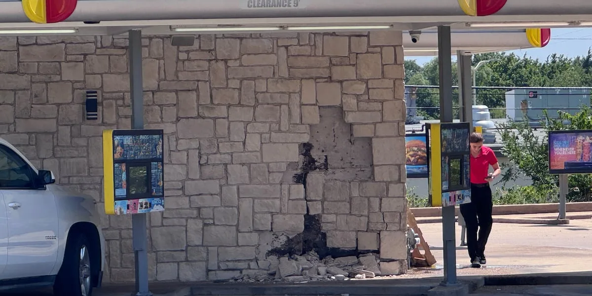 Truck crashes into Denison Sonic, damaging part of building
