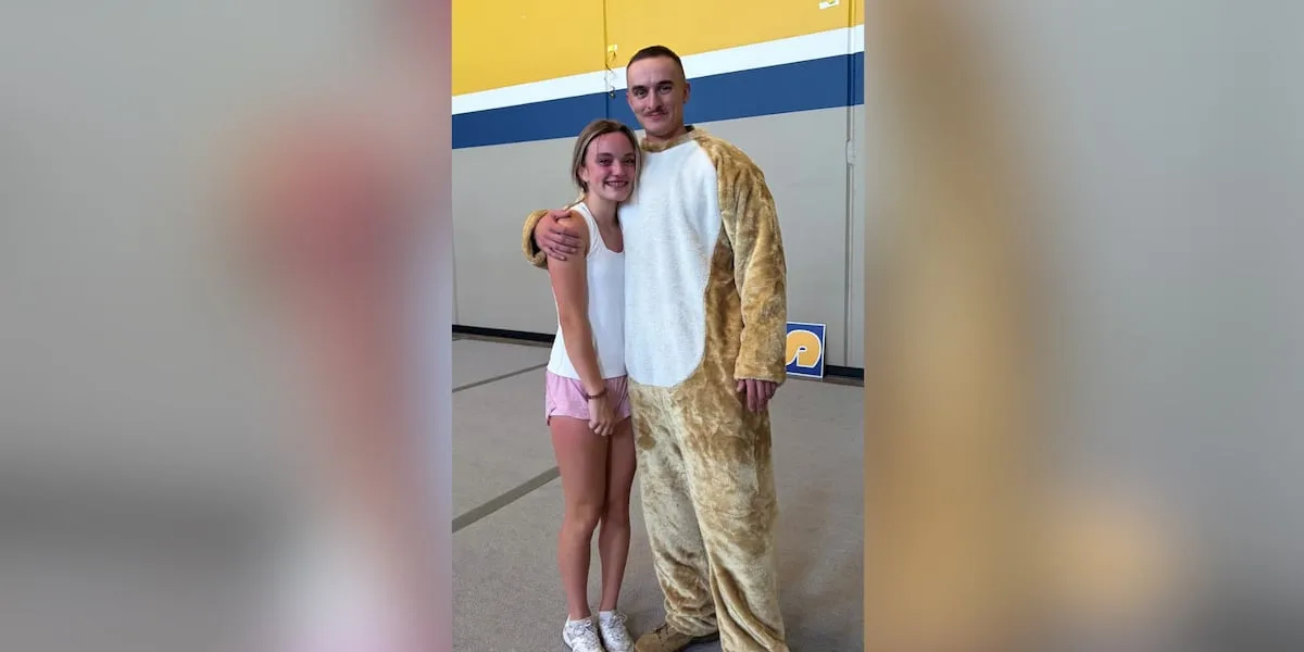Soldier surprises sister while dressed as school's mascot after yearlong deployment