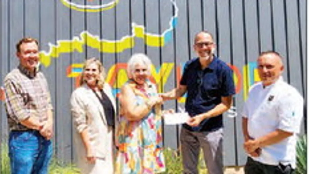 Dinner in the street feeds funds to local nonprofit