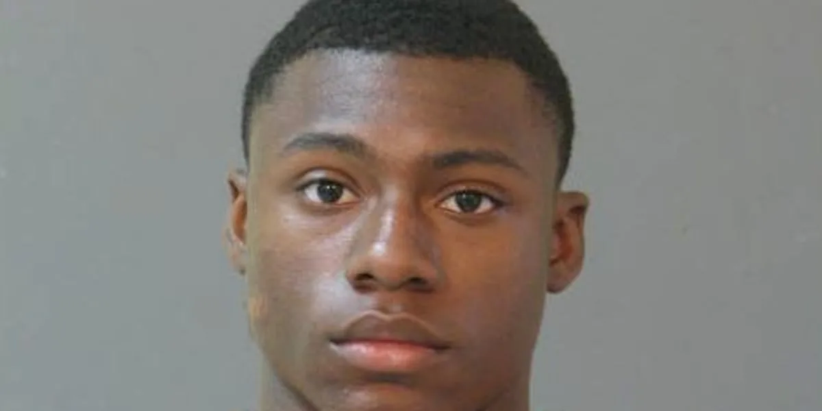 Murder suspect arrested after going to police department to file stolen vehicle report
