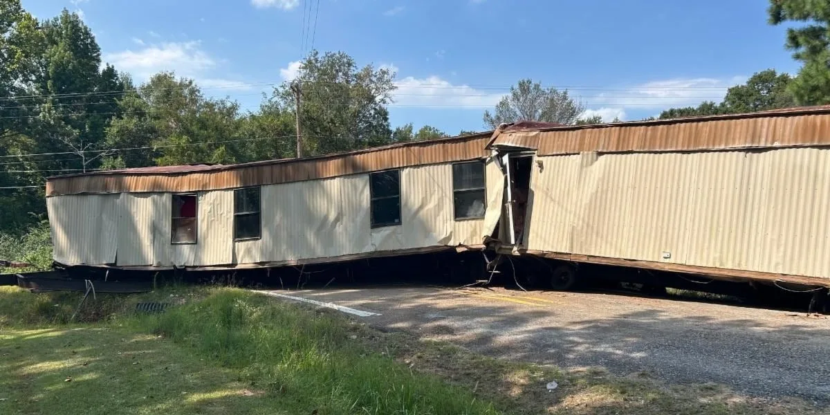 Unlicensed mover gets manufactured home stuck on highway, requiring demolition, authorities say